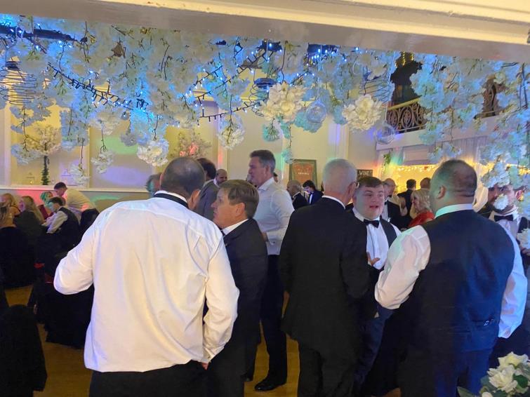 Guests mingle before dinner